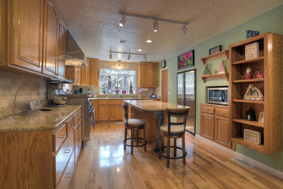 Whip up your favorite meals in this beautifully designed kitchen