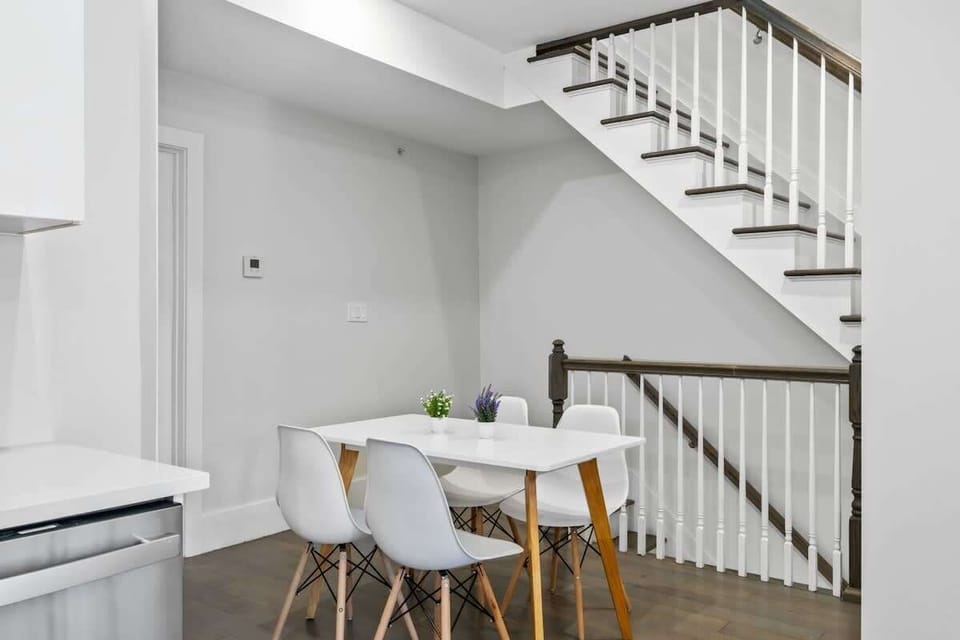A simple and functional dining nook tucked beside the staircase. Perfect for casual meals, work sessions, or morning coffee before heading out for the day.
