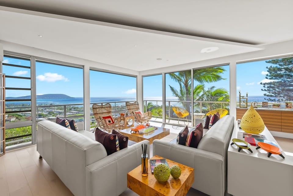 Watch the waves roll in from your bright island retreat.