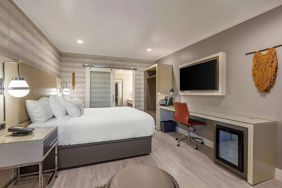 Work comfortably, then relax with mini-fridge convenience and roomy storage.