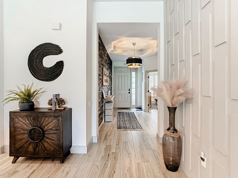 Beautifully styled entryway with warm décor and elegant textures that create a welcoming first impression.