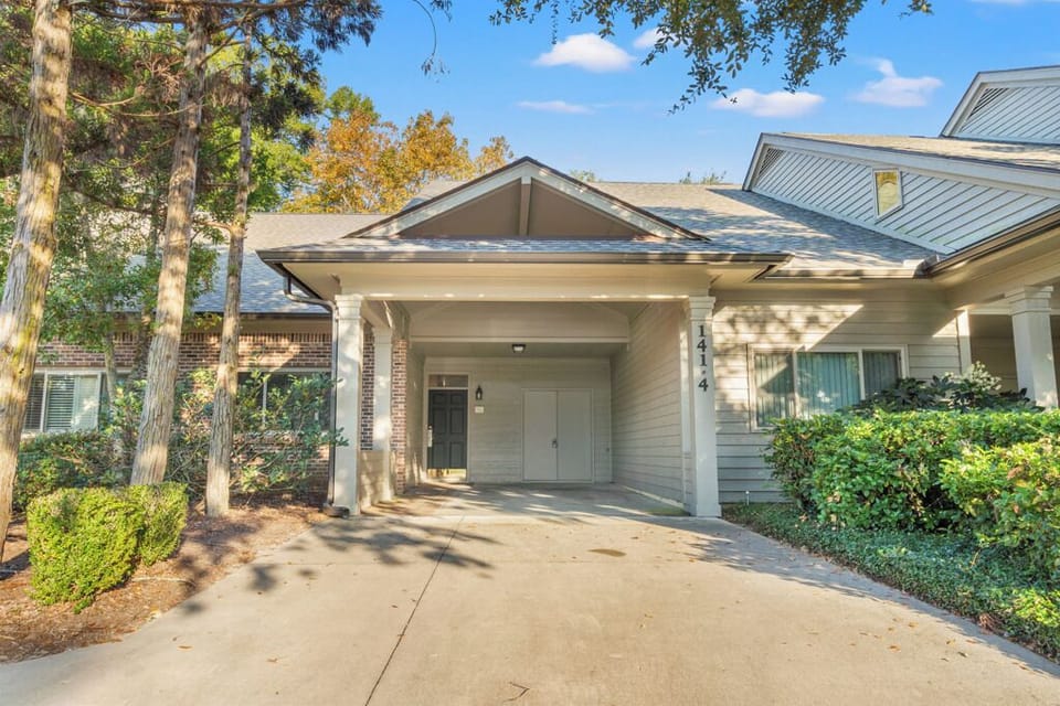 Front entry and carport area. Parking for 3 tandem vehicles easy. 