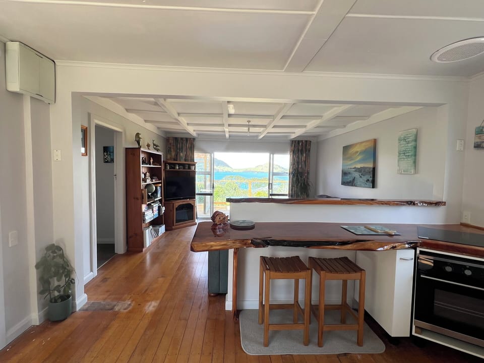 Kitchen looking out though lounge area.
