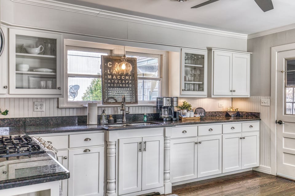 Full kitchen including gas range and oven.