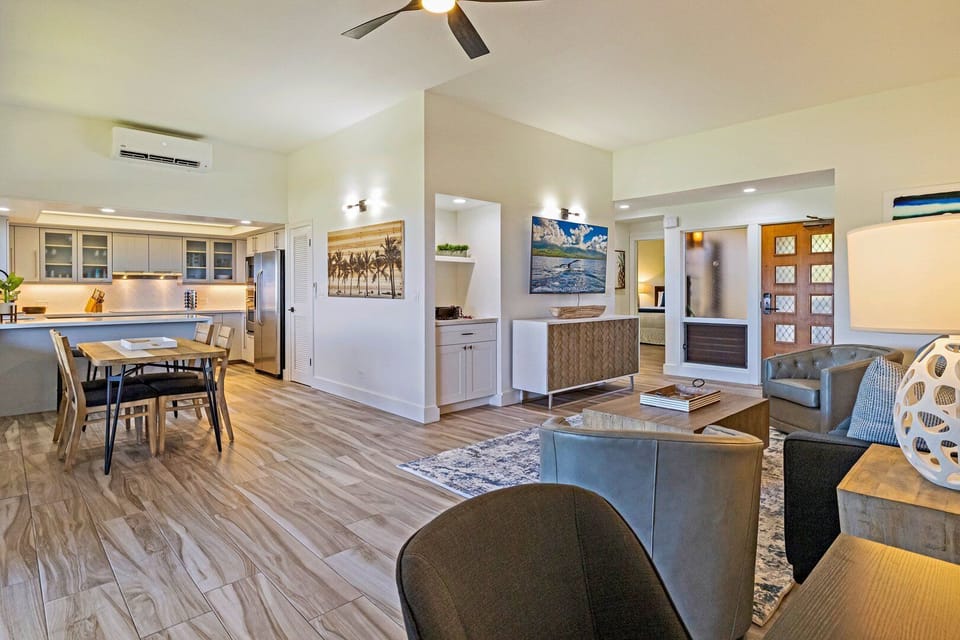 Cook and entertain in an open-concept kitchen featuring modern appliances, a large island, and seamless flow into the living area.
