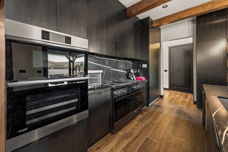 Full Kitchen - Full kitchen with all of the amenities and an open floor plan. New appliances from 2025 construction!