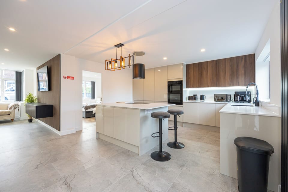  Kitchen with washer, dryer, freezer, fridge, induction hob, dish washer