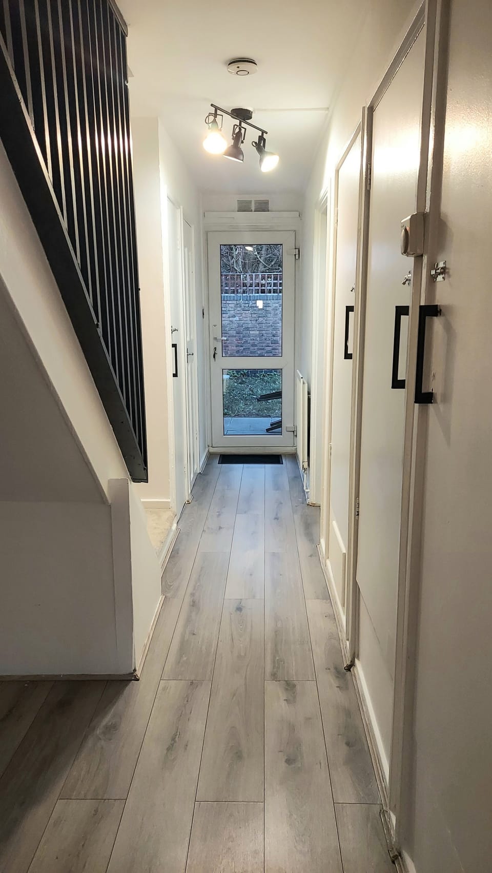 Downstairs hallway (opposite view)