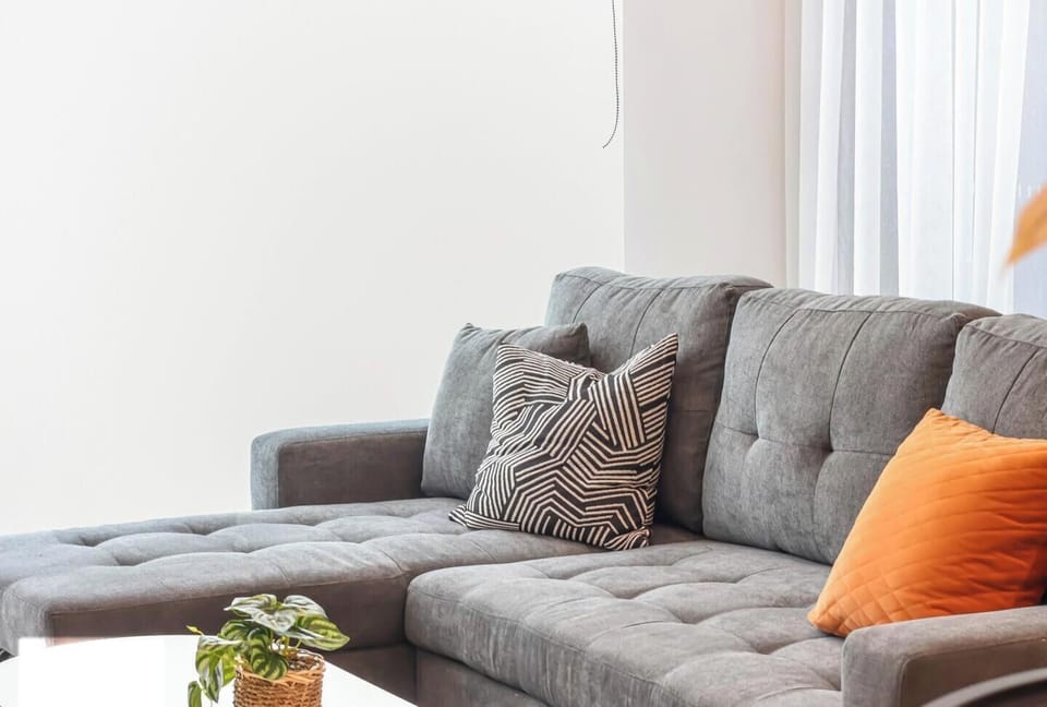 Comfortable living space with sofa bed – available upon request