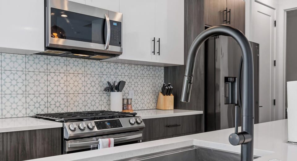 Modern design meets full-sized fridge. Stock up and settle in.