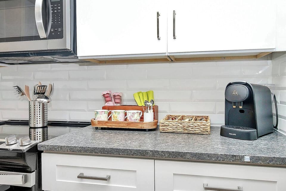Wake up to a cozy coffee and tea station fully stocked with sweet extras, colorful mugs, and all the little touches that make your morning feel special. Sip, savor, and settle into your perfect getaway vibe. Larger pot available for those who need a little more caffeine:)