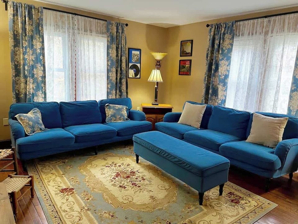 The living room is very spacious and comfortable! 