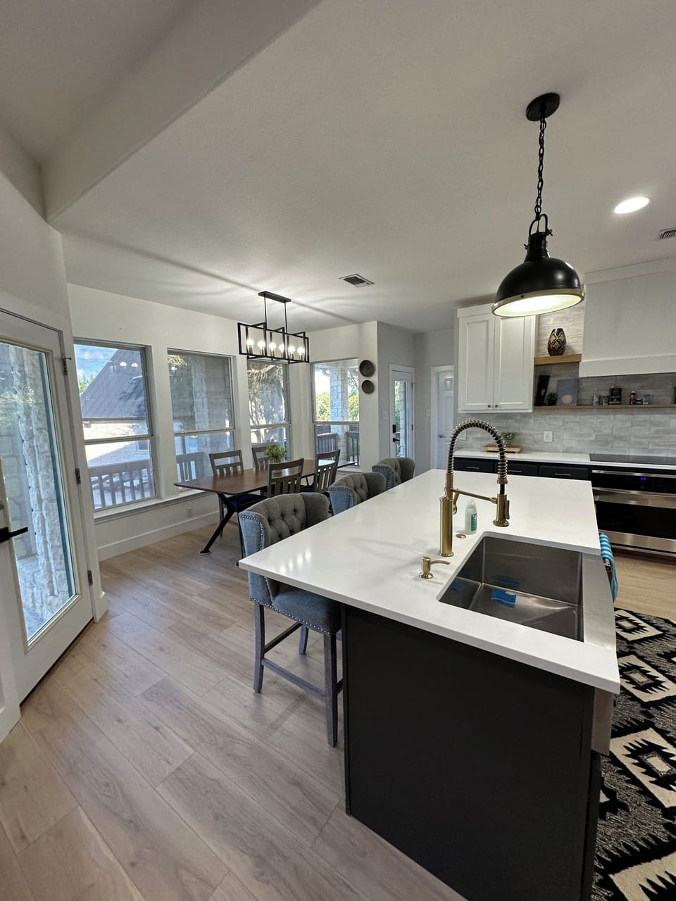 Spacious kitchen with island and dining area