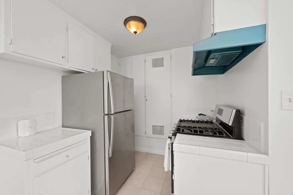 Full Kitchen with Stainless steel features and Gas stove. Lots of counter space for cooking! 