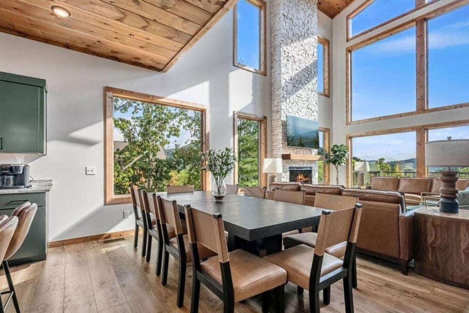 Wood beams, clean lines, and natural textures create a space that feels elevated yet relaxed. It’s the perfect setting for game nights, family dinners, and long conversations that stretch into the evening.