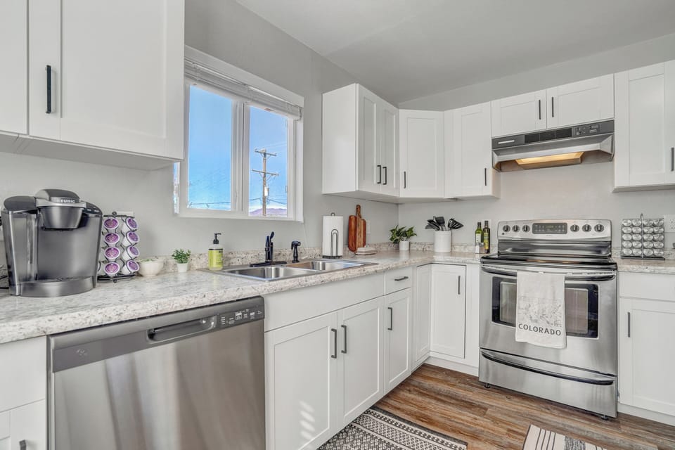 Your bright, fully-equipped kitchen invites you to prepare memorable meals with granite countertops, stainless steel appliances, and everything you need for a perfect home away from home.