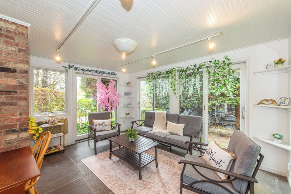 This sunroom/tearoom is a perfect place to unwind and relax after a long day.