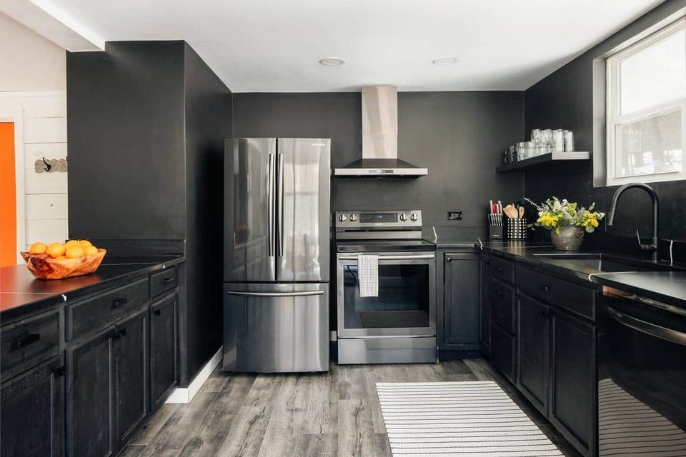 Bright, modern chef’s kitchen with open layout. Perfect for group dinners- Foodies welcome!