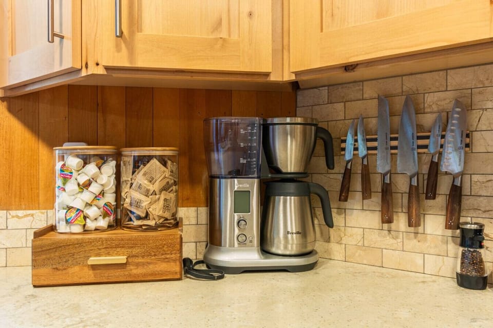 Morning Ritual: Coffee maker, grinder, and fresh beans provided.