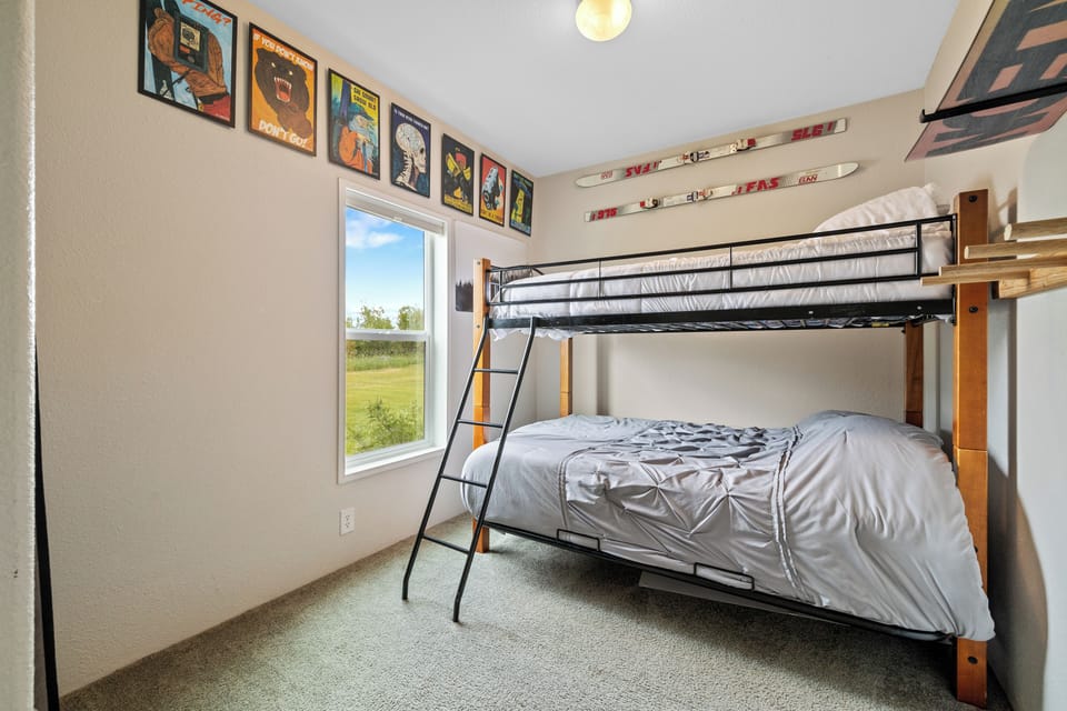 The bottom bunk features a highly comfortable queen bed, top bunk is a full bed.