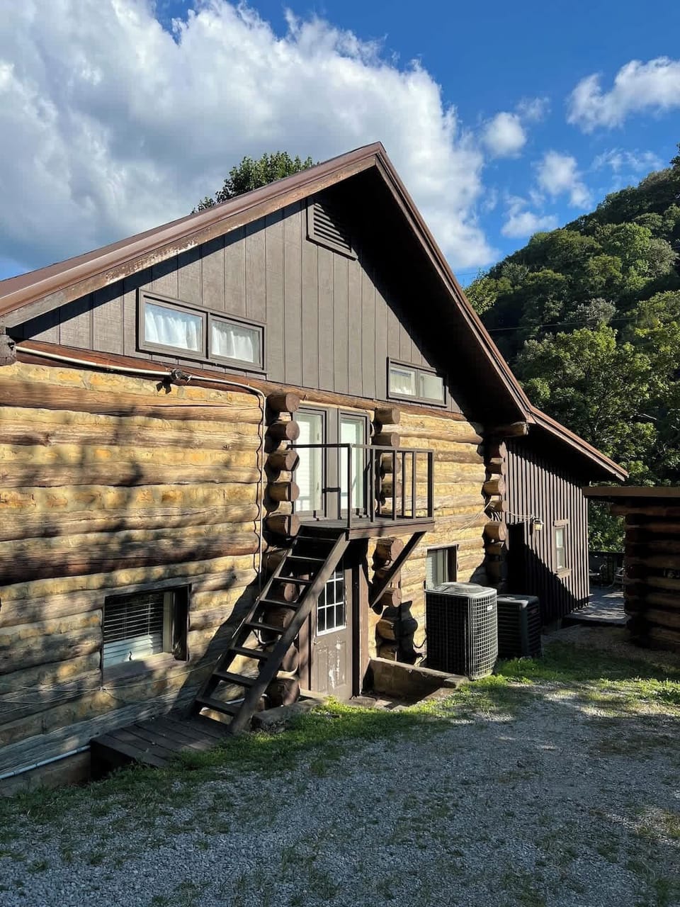 This is the side of the cabin that guests will enter. There is also a nice deck on the back with a seating area. 