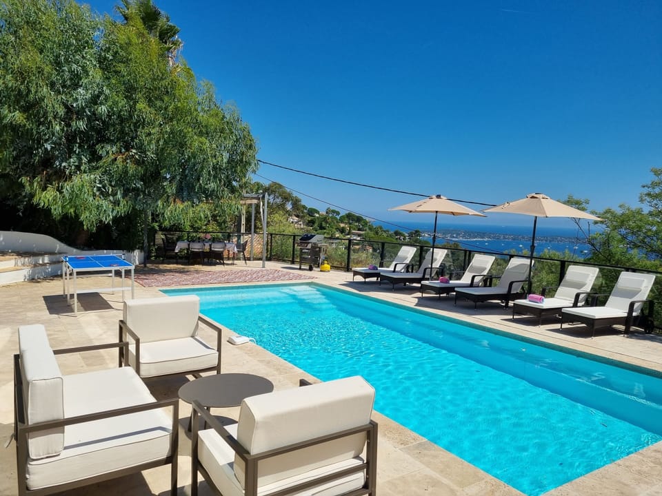 Pool area (current sea view is superior to photo after recent tree trimming)