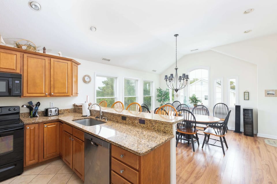 Top Level: Open-concept kitchen and dining area