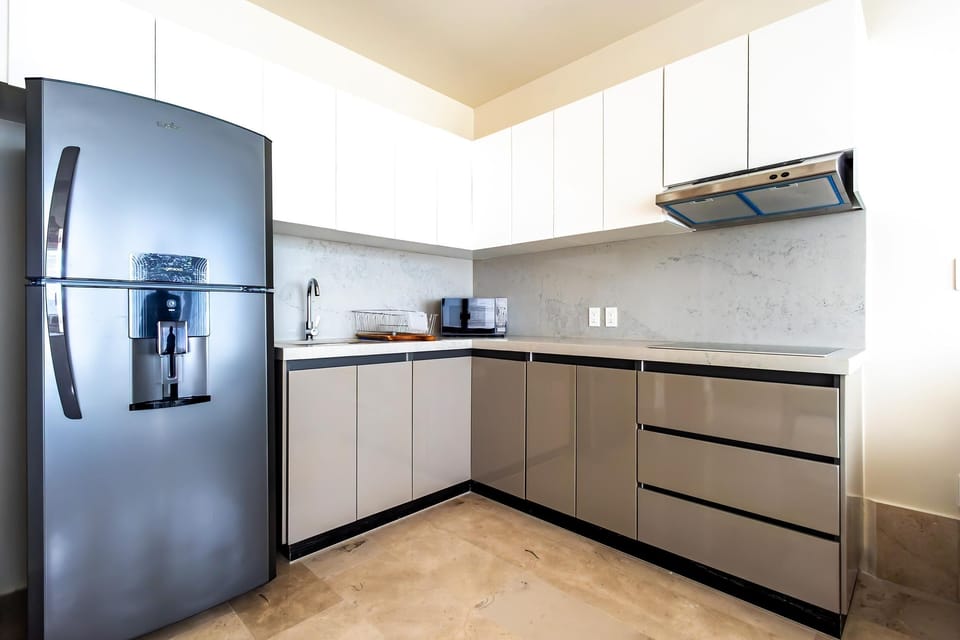 Modern kitchen with sleek appliances and ample storage
