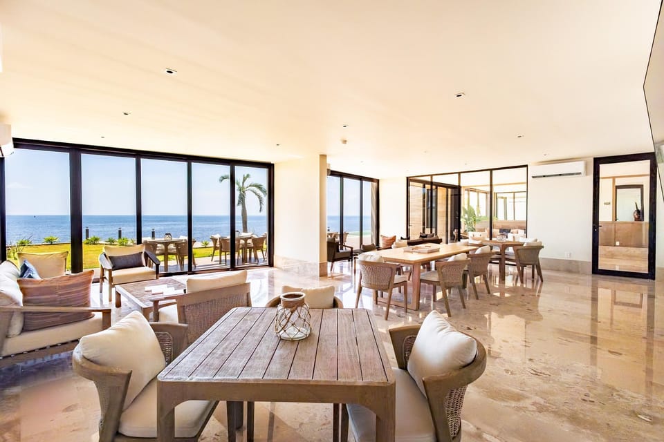 Spacious dining and common area with panoramic ocean views