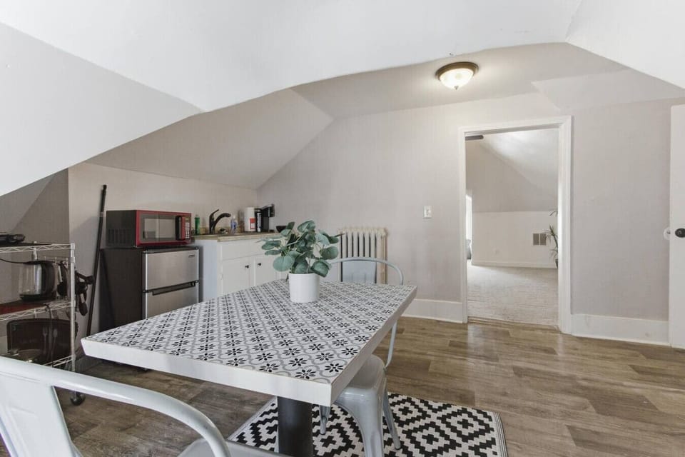 Make simple meals or relax with coffee in this bright kitchenette and dining area.