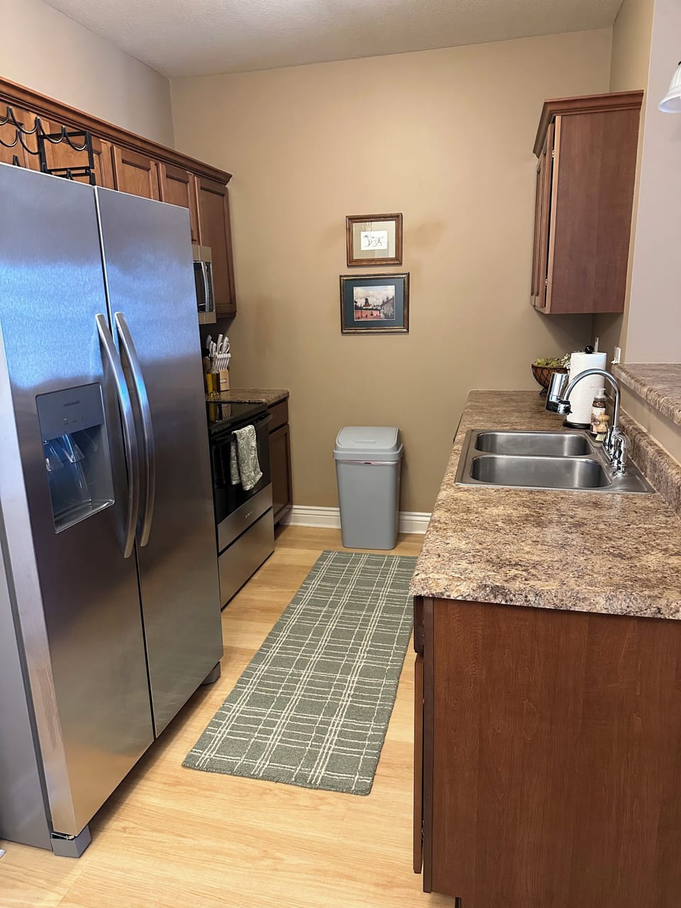 Open kitchen to dinning room and living room with fully stocked kitchen.
