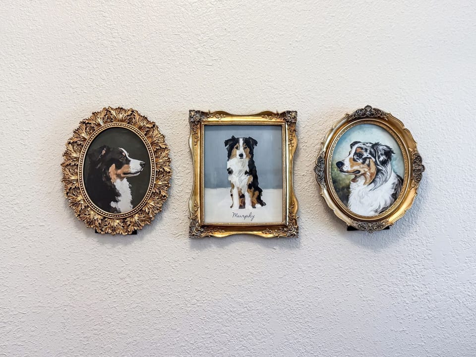 Over a century old, the home has been updated to modern conveniences, includes a charming hallway with a church pew at Mini Aussie Cottage.