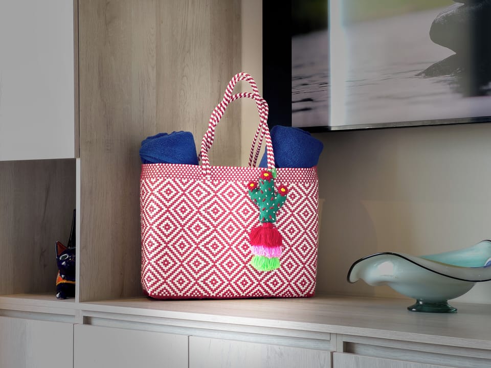 Beach Essentials Ready for Your Stay - A complimentary beach bag filled with towels adds a thoughtful touch to your La Aurora experience. Conveniently placed and ready to go, it makes heading out for a day on the sand effortless and inviting.