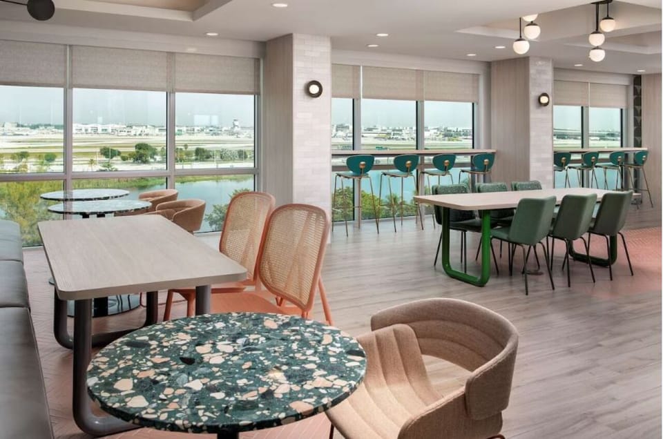 Gather for relaxed bites with airy seating and water views.