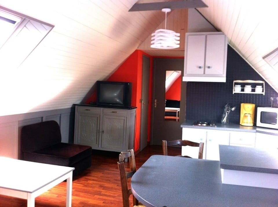 Living room opening onto Margaux kitchen