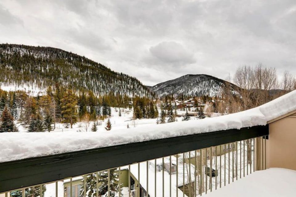 Step out onto the balcony to soak in breathtaking views of snow-capped mountains, offering a serene backdrop for relaxation and family bonding.