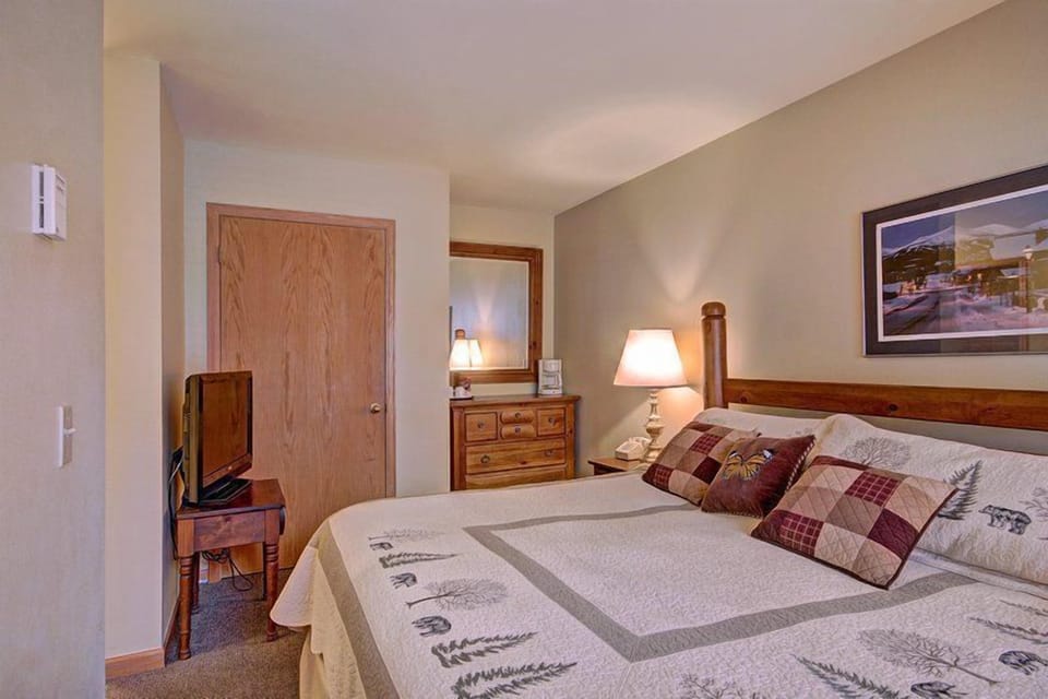 Cozy king room featuring rustic touches and thoughtful details that reflect Breckenridge’s alpine charm.