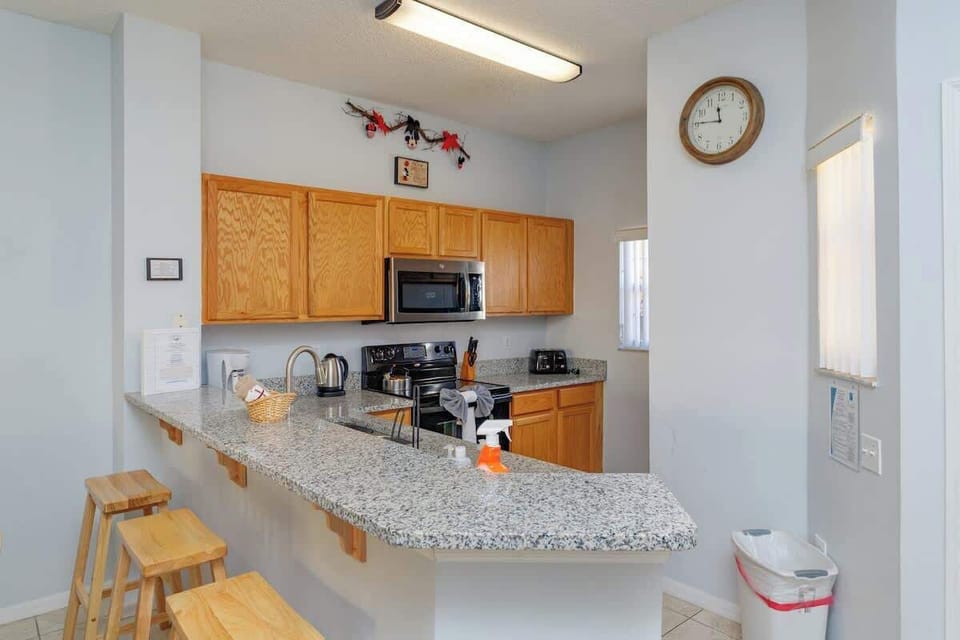 Ground Floor | Culinary Hub | Family-Friendly Setup
With its clean lines and smart layout, this fully stocked kitchen is perfect for families, offering generous counter space and a welcoming island for gathering.