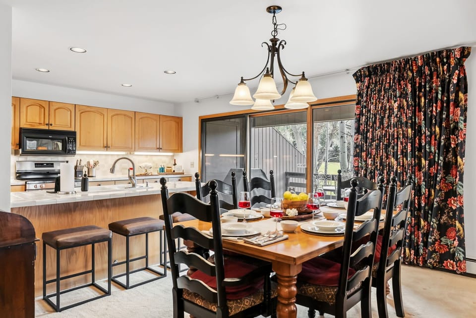 Dining area: Dining table with 6 chairs, adjacent to kitchen
