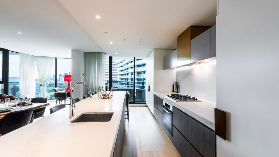 Sleek contemporary kitchen with premium appliances.