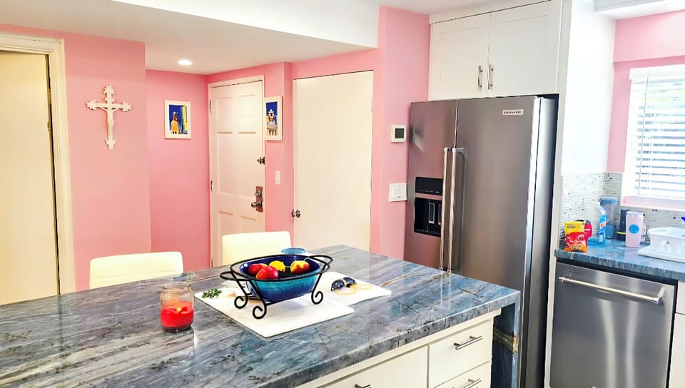 Entrance, full size washer/dryer closet. New refrigerator, dishwasher, sink.