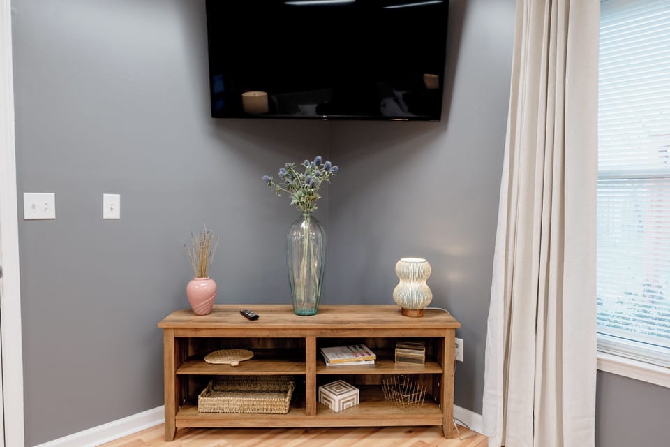 Large flat screen TV in the bedroom