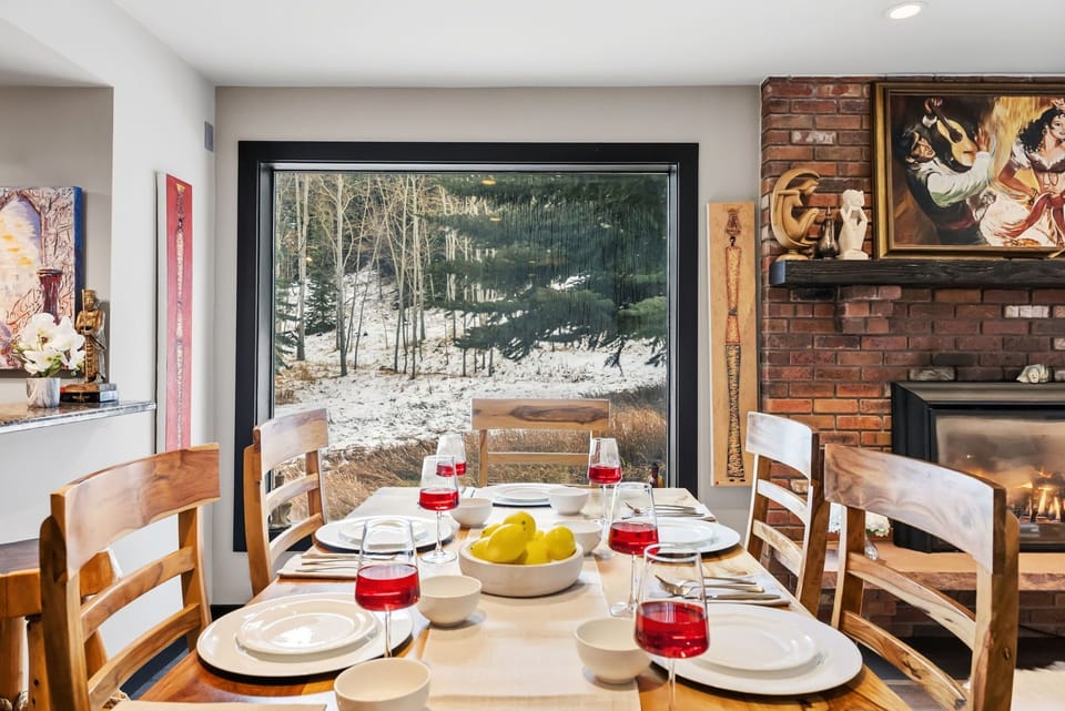 Dining area: Dining table with 7 seats, 2 barstools