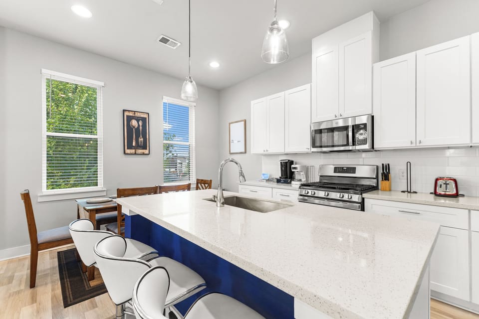 Stylish kitchen island with bar seating, ideal for casual dining or morning coffee.