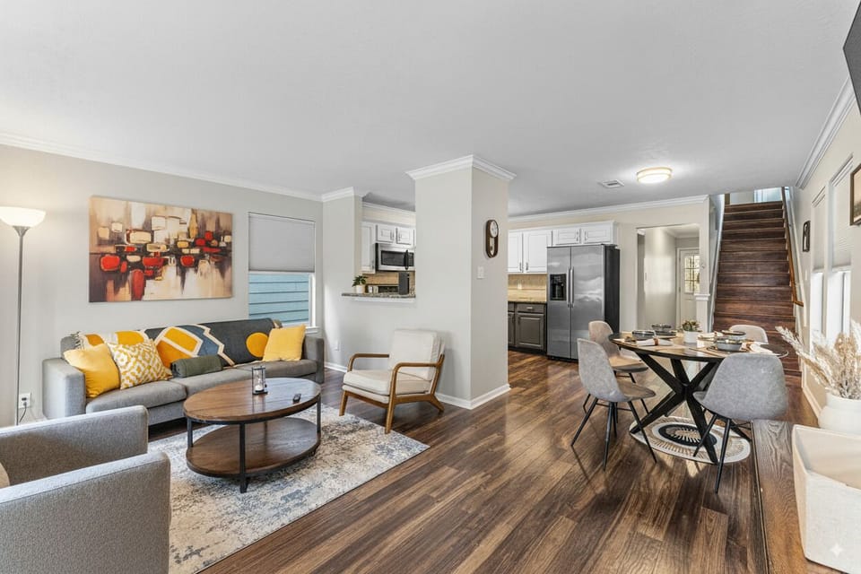 Open-concept living with dining & kitchen access