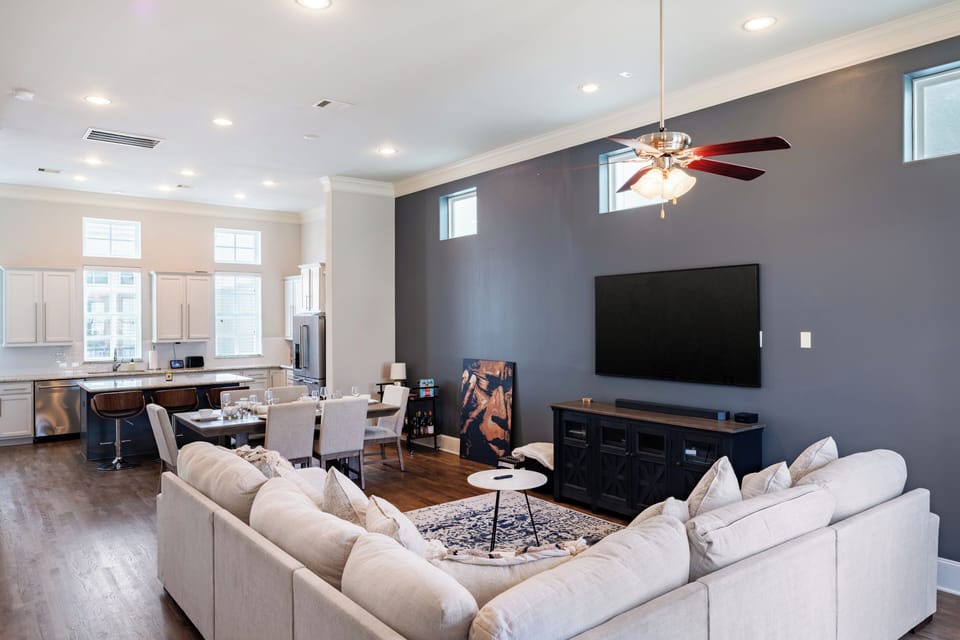 Chic decor featuring a 75" Smart TV. Ideal for movie nights or catching up after a day of exploring.