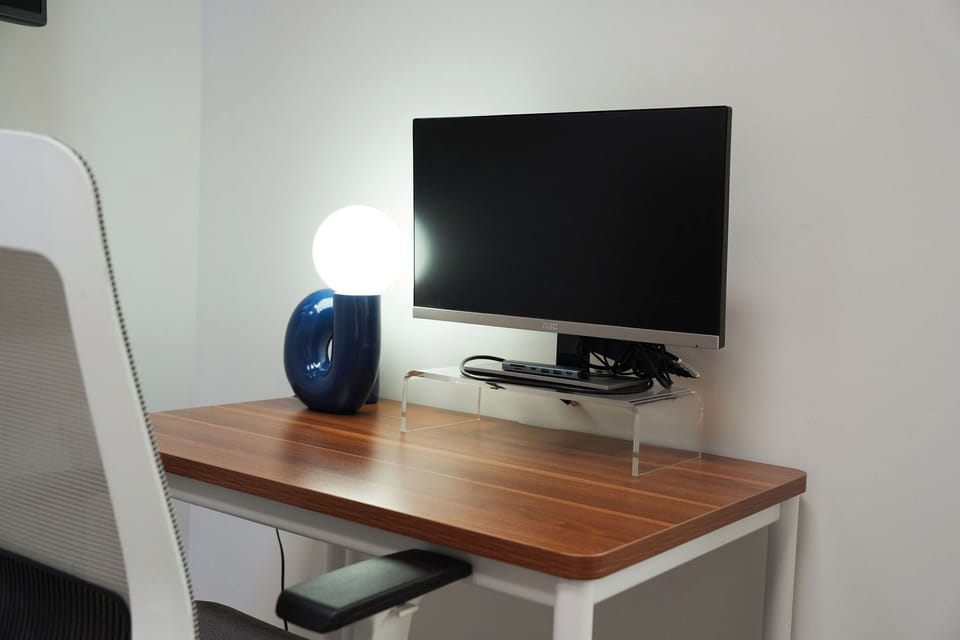 WFH setup w. fiber optic internet, extended monitor & Branch ergonomic furniture