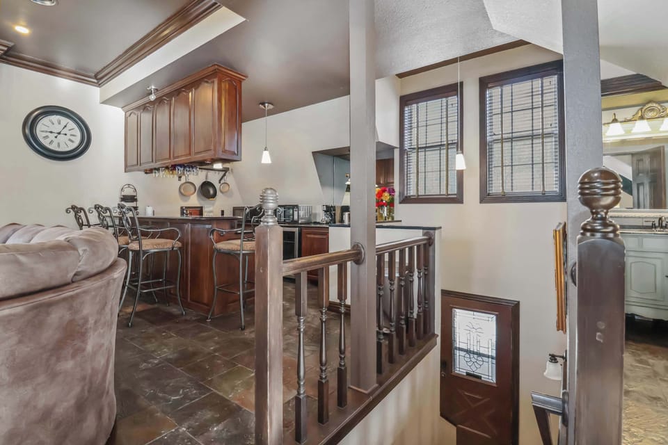 Kitchen with bar above the stairway