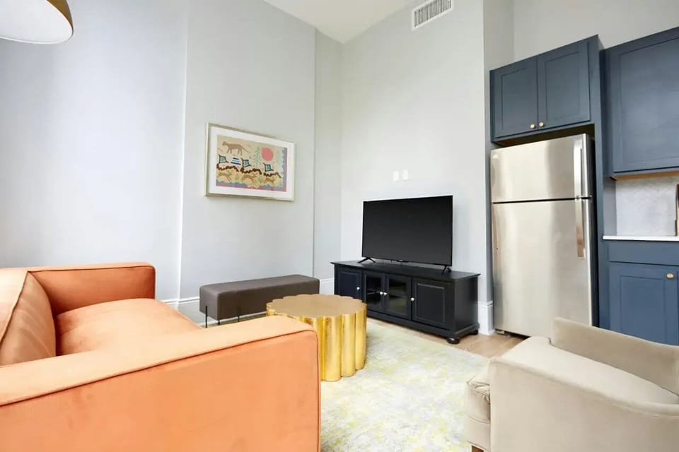 The open-concept living area offers seamless transitions between the living and kitchen areas.