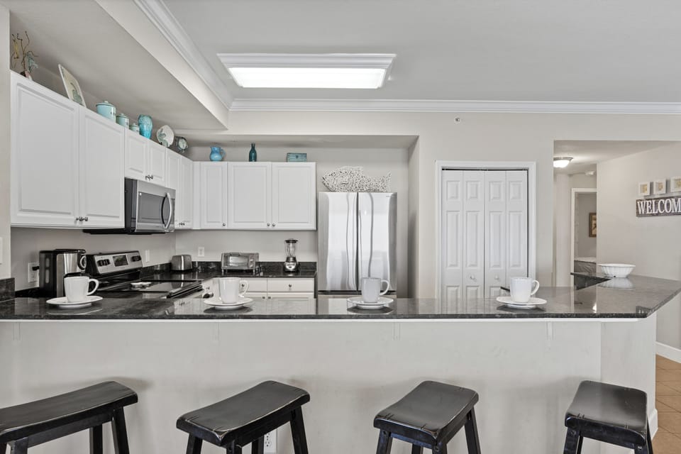 Kitchen with barstool seating.